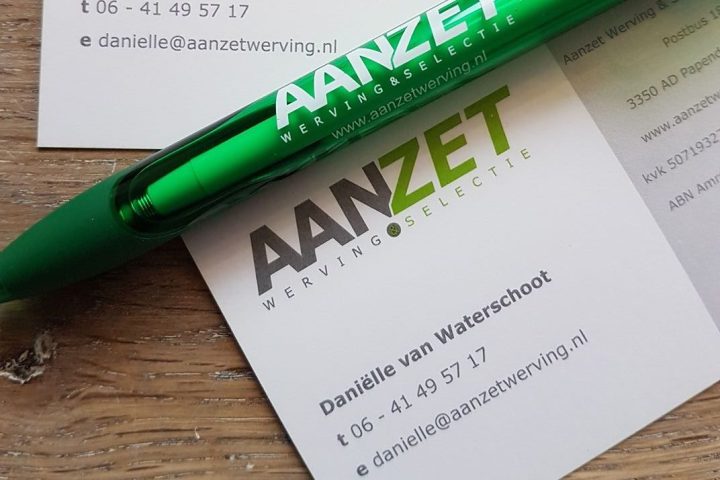 Pen en visitekaartje van Aanzet